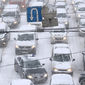 Москва стоит в пробках из-за сильнейшего снегопада