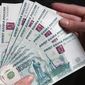 Российский рубль упал на бирже ММВБ к основным валютам  